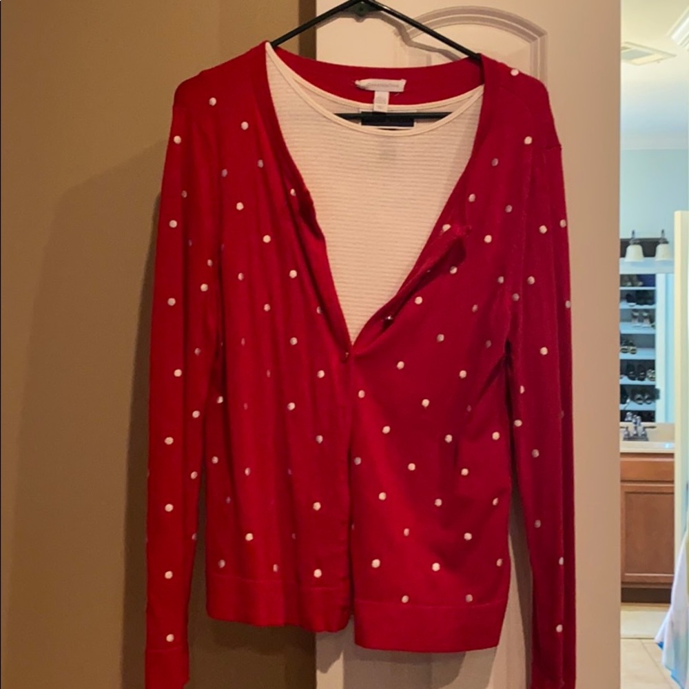 Red cardigan with white polka dots